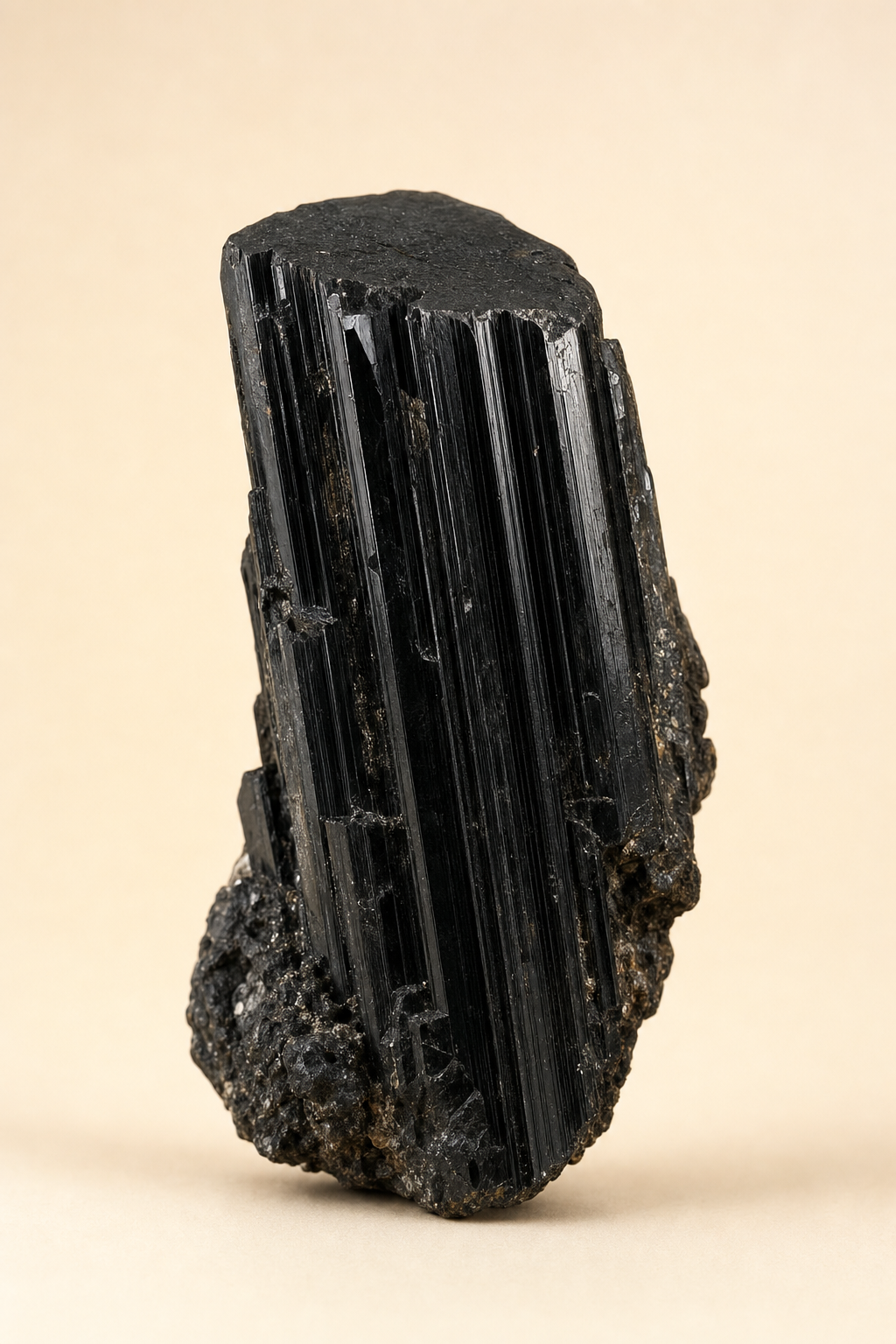 A raw black tourmaline crystal specimen